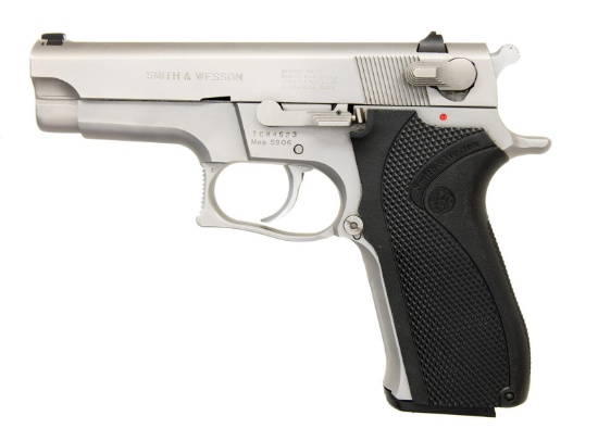 S&W MODEL 5906 STAINLESS SEMI AUTO PISTOL.