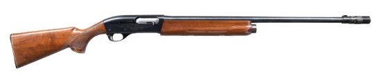 REMINGTON MODEL 1100 SEMI AUTO SHOTGUN.