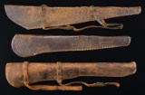 THREE WINCHESTER STYLE CARBINE SCABBARDS.