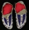 FINE PAIR OF FULLY BEADED PLAINS INDIAN MOCCASINS.