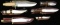 GROUP OF 6 CUSTOM KNIVES WITH SCABBARDS.