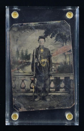 QUARTER PLATE CIVIL WAR TINTYPE OF A WELL-ARMED
