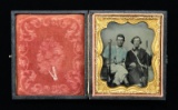 VERY FINE TINTED RUBY AMBROTYPE OF TWO YOUNG MEN