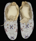 FINE PAIR OF FULLY BEADED CHEYENNE MOCCASINS.