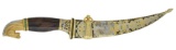 HIGHLY DECORATED DAGGER IN THE FORM OF A JAMBIYA.