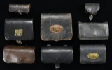 7 CARTRIDGE BOXES & A CAP BOX.