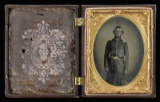 CIVIL WAR TINTYPE OF TRIPLE ARMED UNION OFFICER.