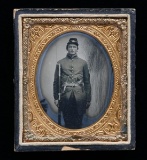 CIVIL WAR AMBROTYPE OF TRIPLE ARMED SOLDIER.