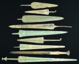 GROUP OF NINE ANCIENT NEAR EASTERN BRONZE EDGED