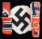4 WWII GERMAN FLAGS & A CENTER DEVICE.