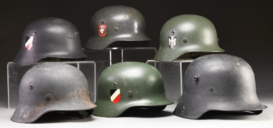 6 WWII GERMAN HELMETS.