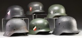 6 WWII GERMAN HELMETS.