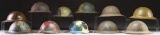 11 US M1917 HELMETS PAINTED WITH UNIT INSIGNIA OR