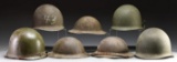 LOT OF 7 US HELMETS.