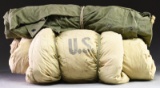 US MILITARY CLOTHING & A SLEEPING BAG.