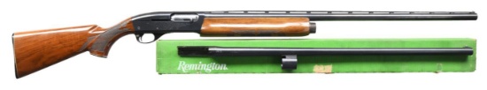 REMINGTON 1100 SEMI AUTO SHOTGUN.