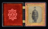 TINTYPE OF A STANDING CIVIL WAR ENLISTED SOLDIER.