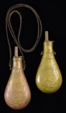 2 REPRODUCTION POWDER FLASKS.