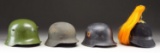 3 GERMAN HELMETS & 1 US M1881 HELMET.
