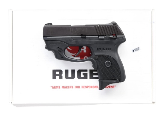 RUGER MODEL LC9 SEMI-AUTO PISTOL WITH LASER SIGHT.