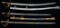 2 REPRODUCTION SABERS & 1 BRITISH SWORD.