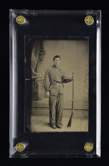 A 6th PLATE TINTYPE OF A HUNTER OR SOLDIER.