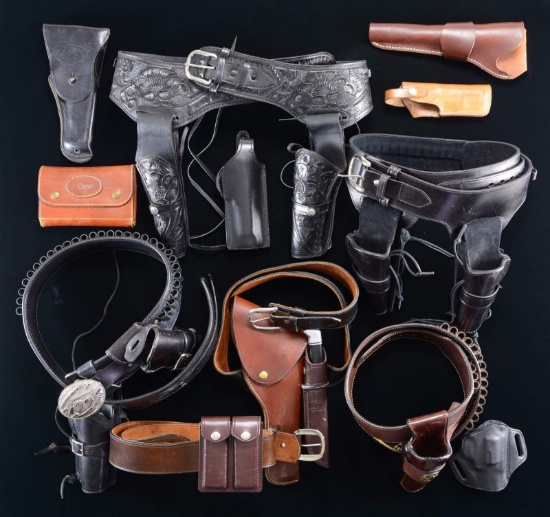 FINE GROUPING OF HOLSTERS AND ACCESSORIES.
