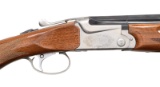 SKB MODEL 585 O/U SHOTGUN.
