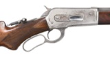 WINCHESTER MODEL 1886 DELUXE LEVER ACTION RIFLE.
