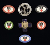7 WWII STYLE GERMAN PINS & BADGES.