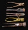 5 EARLY BULLET MOLDS.