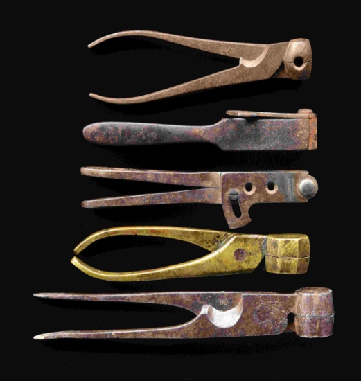 5 EARLY BULLET MOLDS.