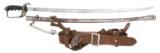 2 US M1903 OFFICER’S SABERS WITH SAM BROWN BELTS.