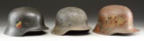 3 GERMAN HELMETS.