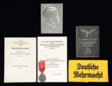 WWII GERMAN AWARD DOCUMENTS, ARMBAND, & PLAQUES.