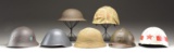 7 MILITARY HELMETS FROM VARIOUS COUNTRIES.