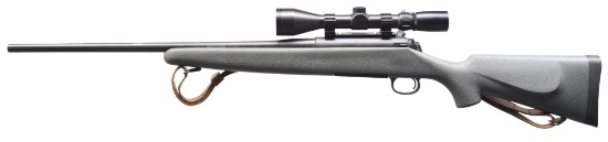 REMINGTON 710 BOLT ACTION RIFLE WITH ORIGINAL BOX.