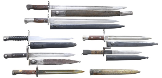 VARYING GROUP OF 7 VINTAGE MILITARY BAYONETS.