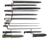 GROUP OF 9 VINTAGE AND ANTIQUE MILITARY BAYONETS.