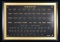 COLLECTEM BOARD DISPLAYING WINCHESTER RIFLE AND