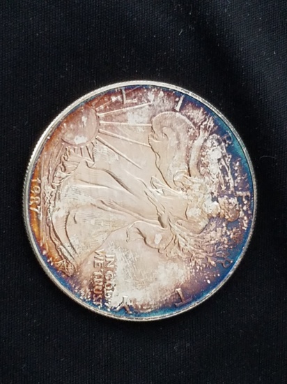 1987 1 oz. Silver American Eagle BU Nice Rainbow Toning