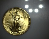 1986 $5 GOLD Eagle 1/10 oz NGC MS69