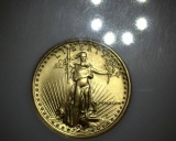 1987 $5 GOLD Eagle 1/10 oz NGC MS69