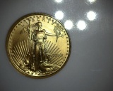 1999 $5 GOLD Eagle 1/10 oz NGC MS69