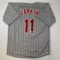 Autographed/Signed Barry Larkin Cincinnati Grey Pinstripe Baseball Jersey Beckett BAS COA