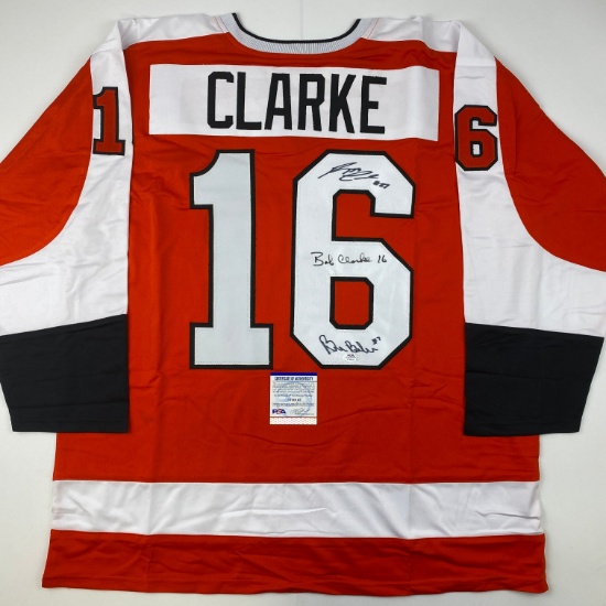 Autographed/Signed Reggie Leach, Bobby Clarke & Bill Barber Philadelphia Orange Jersey PSA/DNA COA