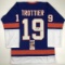 Autographed/Signed Bryan Trottier HOF 97 New York Blue Hockey Jersey JSA COA