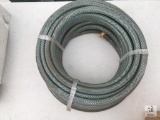 Unused 1/2in. X 65ft. Blue/ Green Water Hose