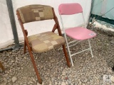 1 Wooden Folding Chair w/ Padding & 1 Pink Plastic Folding Chair