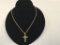 18 inch 14 kt Gold Chain and 14 Kt Cross Pendent.